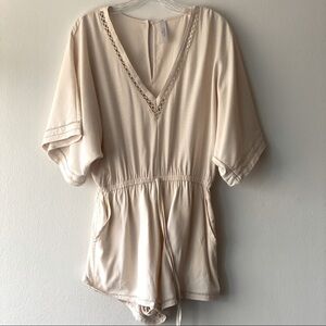 Mahina cream romper size M